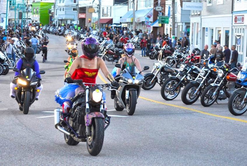 <p>Wonder Woman and her super hero entourage were on patrol at the Wharf Rat Rally Sept. 3.</p>