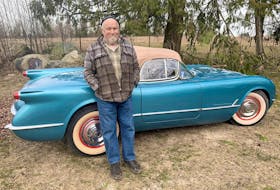 Corvette enthusiast Bob McCoy with the show winning 1954 model he restored from the ground up. Alyn Edwards photo
