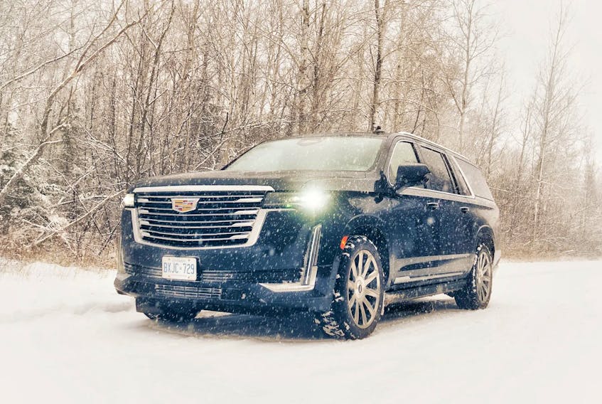 The Escalade is designed to be a comfortable long-distance highway cruiser. Justin Pritchard/Driving