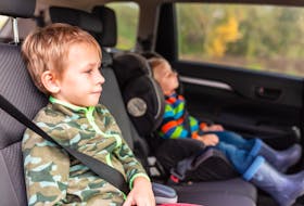 Parents have to decide when the time is right to safely graduate their child from a car seat to a booster seat. 123rf stock photo