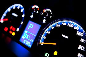 Close-up view of speedometers and other gauges on a passenger car. 123rf stock photo