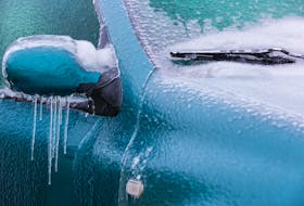 Winter weather conditions, especially a thick glaze of ice, can be hard on vehicles and their drivers. 123rf stock photo
