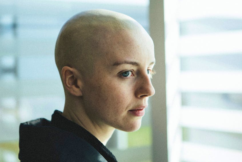 Kacey Rohl stars in White Lie as a university student faking a cancer diagnosis.