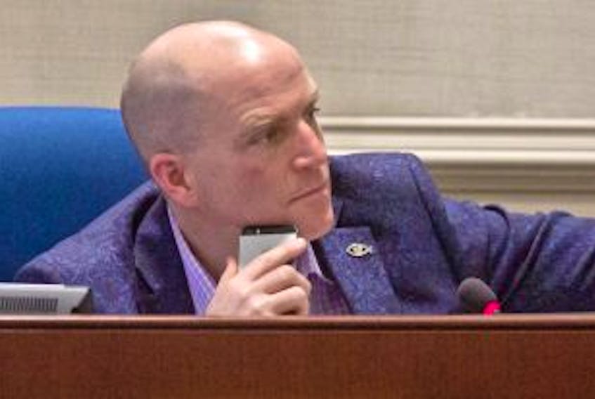 ['Deputy Mayor Matt Whitman sits in council chambers on Tuesday morning.']