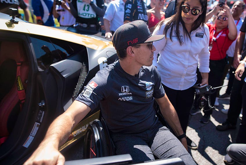 Injured driver Robert Wickens of Canada is photographed before leading the parade lap in a car fitted with hand controls before the 2019 Honda Indy Toronto race in Toronto, Sunday July 14, 2019. 