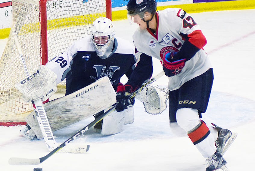 Valley Wildcats goalie Cole McLaren keeps a close eye on Pictou County Crusher Michael Dill, who hails from West Hants. At the Christmas break, Valley sits seven points behind the Truro Bearcats for the fourth and final playoff spot in the division. - Kevin Adshade