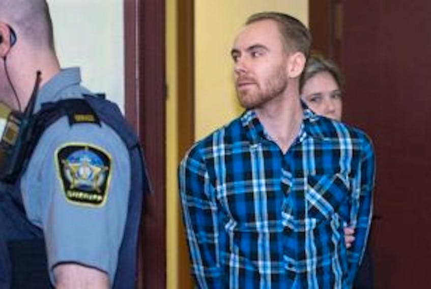['William Sandeson arrives for the start of his preliminary hearing at provincial court in Halifax. Sandeson is charged with first-degree murder in the death of Taylor Samson, a fellow Dalhousie University student, who was last seen on Aug. 15, 2015 and whose body has not been found.']