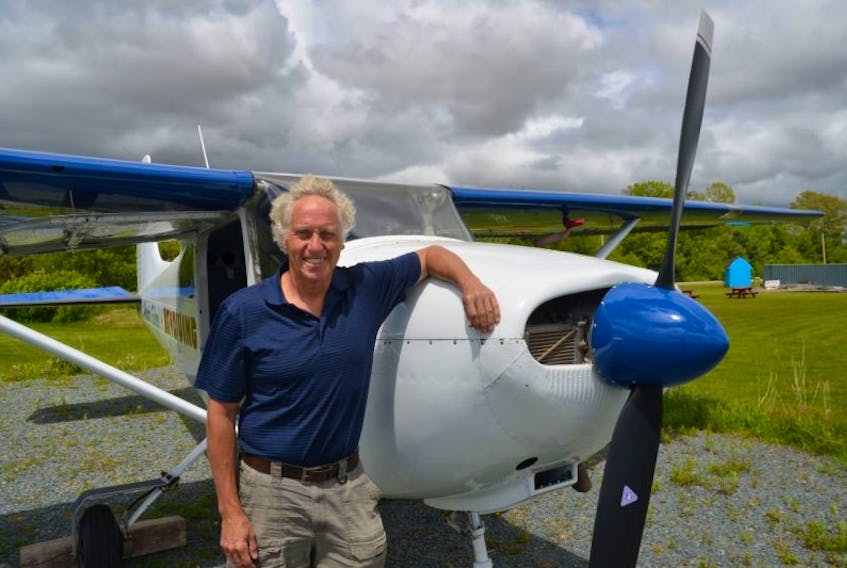 Atlantic School of Skydiving owner David Williamson stands with one of his Cessna 182s. Williamson had been planning an expansion at the Waterville airport for some time but this is no longer possible with the upcoming closure of the facility.