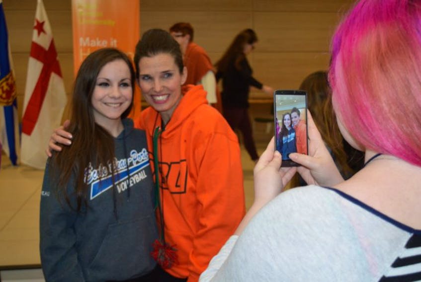 Sarah Boudreau, a Grade 11 student at École Beauport in Arichat, had her photo taken with the federal Minister of Science Kirsty Duncan following the daylong Women in Science event at Cape Breton University on Saturday.