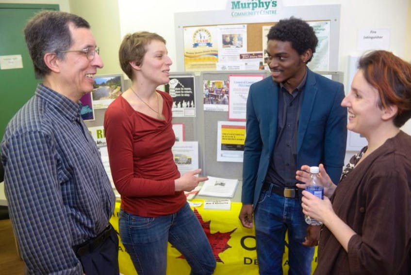 <span>Zain Esseghaier of the P.E.I. Muslim Society, from left, chats with Josie Baker of the Cooper Institute, UPEI student&nbsp; Dante Bazard and Sarah Tamula of the Council of Canadians and Black Culutral Society of P.E.I. before a panel discussion and workshop this weekend aimed at combatting racism in P.E.I. Baker moderated the panel, which saw both Esseghaier and Bazard speak along with Julie Pellissier-Lush of the Mi'kmaq Family Resource Centre and UPEI students Donisha Been and Keyshawn Bonamy. Tamula was an organizer for the event.&nbsp;</span>
