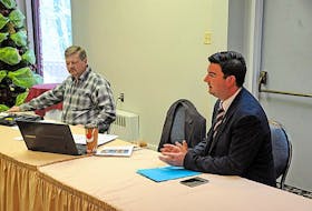 Cory Foster, left, executive director of the Newfoundland and Labrador outfitters Association, and Ron Hicks, the association’s president, lead the discussions at the organization’s annual conference in Corner Brook Friday.
