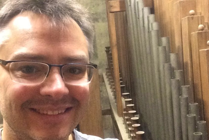 Craig Humber is shown at the E.F.Walcker organ of 1878 in the Votivkirche, Vienna ,Austria in this submitted photo.