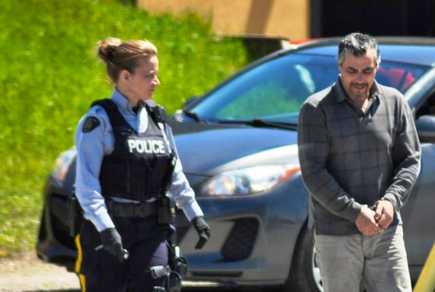 Quinton Benoit is seen on his way into Stephenville Provincial Court on Tuesday afternoon.