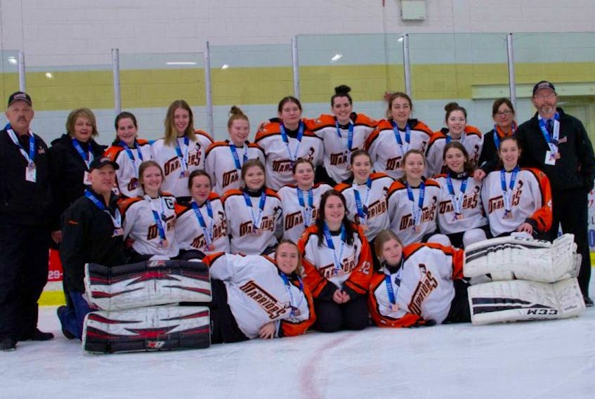 The Western Warriors captured bronze at the 2017 Atlantic AAA Midget Female Hockey Championship with a 3-1 win over the Moncton Rockets.Team members include, from left (front) Madison Marche, Charlotte Elliiott and Aleisha White; (middle) coach Randy Moores, Alyson Moores, Kailey Genge, Kaylee Gerrow, Brooklyn Childs, Jolena Gillard, Jillian Rideout, Olivia Henley and Megan Gabriel; (back) trainer George Rideout, Hockey NL representative Carolyn Yates, Carmen Elliott, Jennifer Guy, Emma Reid, Rebecca Reid, Julie Pink, Kaitlin Coles, Haley Osmond, manager Debbie Reid and assistant coach Shawn Gerrow.