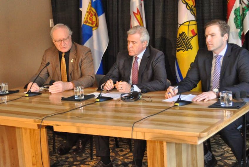 Three of the four Atlantic premiers wrapped up a Council of Atlantic Premiers' meeting with a press conference at Marble Inn in Steady Brook on Monday morning. From left, are, P.E.I.'s Wade MacLauchlan, Newfoundland and Labrador 's Dwight Ball and New Brunswick's Brian Gallant.