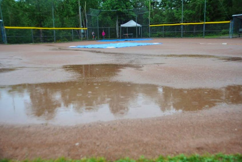 Rain has delayed action in the Mary Tavenor Memorial Baseball Tournament in Corner Brook, but it is hoped play will resume Saturday afternoon.