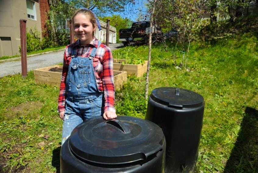 Carly Johannesen, a Grade 6 French immersion student at Immaculate Heart of Mary School in Corner Brook, gave a presentation on composting — in French, of course — during the school’s market and agriculture expo Thursday. The day showcased the flowers and vegetables grow in the school’s greenhouse, in addition to students facilitating agricultural sessions and a visit from some live farm animals.