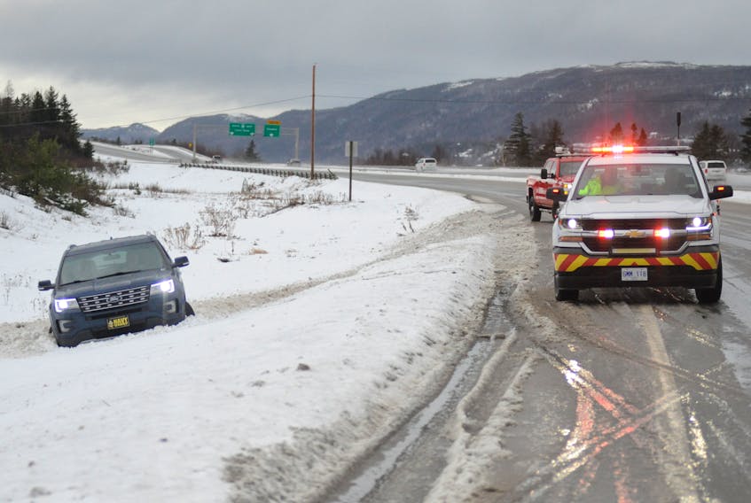 Neither the man nor the woman travelling east in this Ford SUV were hurt when the man driving lost control and went off the road on a slushy section of the Trans-Canada Highway near Pasadena Monday morning. The couple, who said they were heading to St. John’s were waiting for a tow out of the deep snow before resuming their trip.