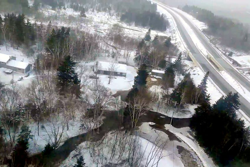 This photo taken from a helicopter shows the area of the flooding and its proximity to the Trans-Canada Highway.