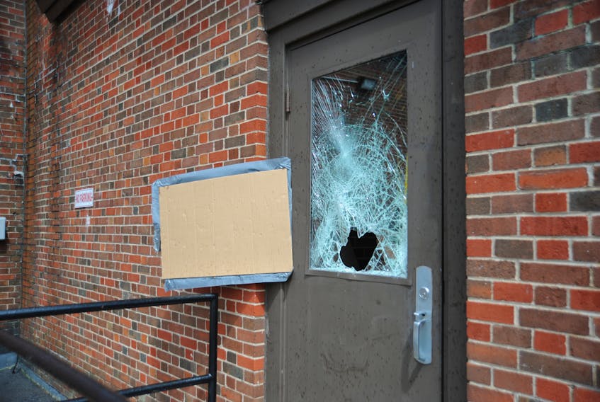 The broken glass in this door at the rear of Holy Redeemer Parish cathedral in Corner Brook shows how a burglar gained entry into the church this past weekend.