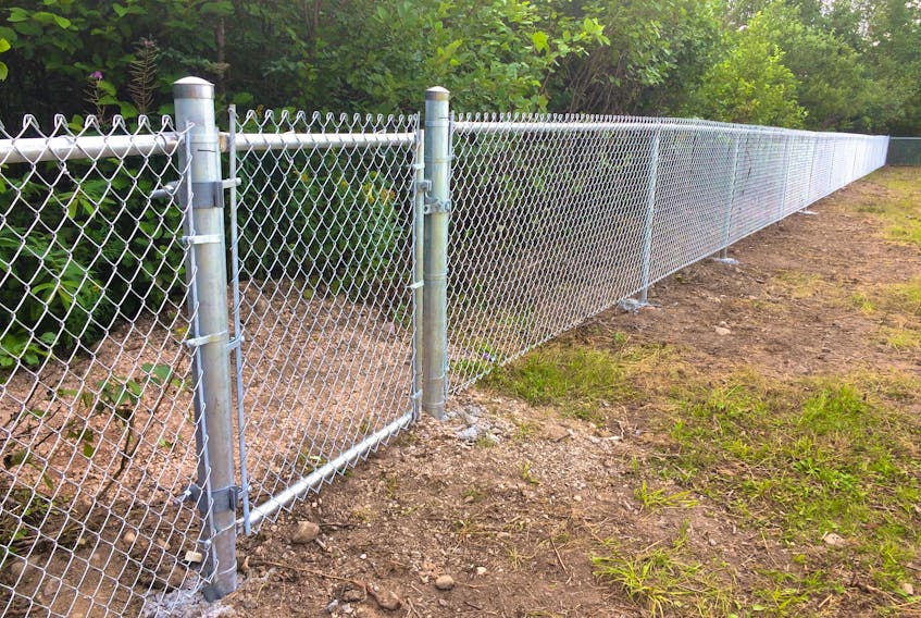 When students returned to Pasadena Elementary in Pasadena earlier this week the school playground looked a little different with the addition of this metal-chain link fence.