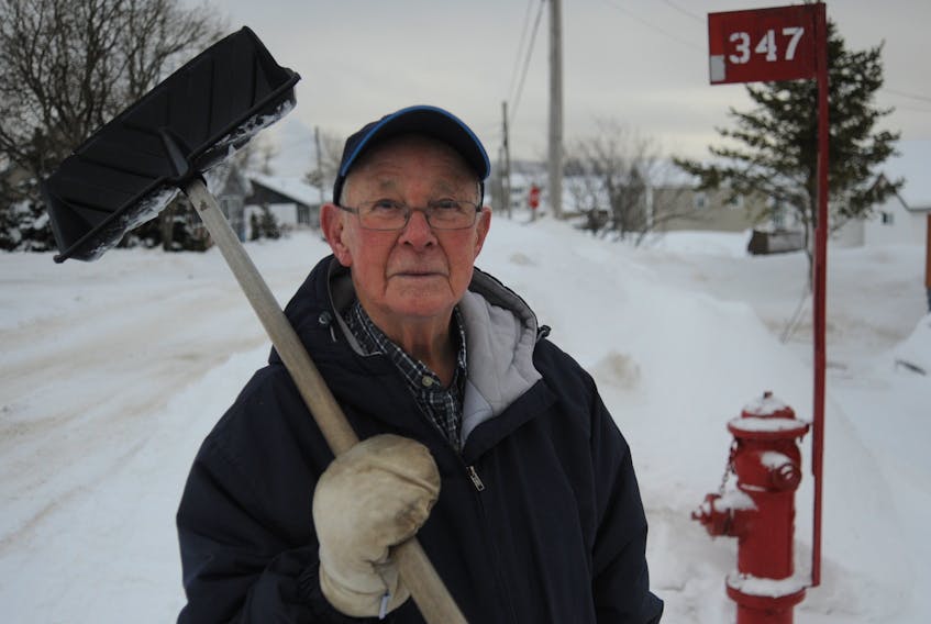 Ron Denny is 92 and has been clearing the snow away from this fire hydrant outside his home on Aspen Road in Corner Brook for as long as it’s been there.