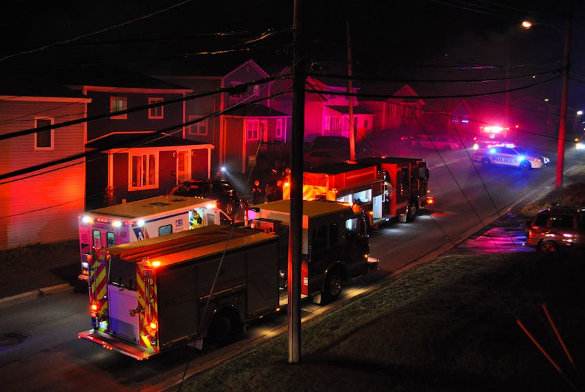 Emergency personnel deal with a house fire on Country Road in Corner Brook early Tuesday morning.