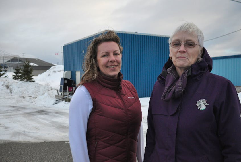 Laurie Flynn, left, architectural drafter, and Diane Simon, president of the Southwest Coast SPCA, pose for a photo near the location of a new animal shelter expected to start this spring.