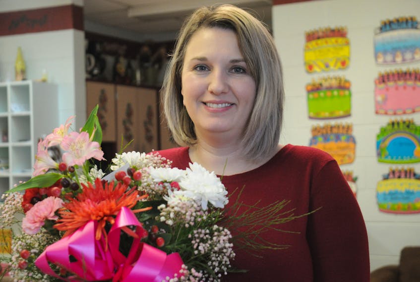 Ricki Hawco, a teacher at Stephenville Elementary School, was a wife who was feeling the love when she received flowers for Valentine’s Day on Thursday from her husband Michael Hawco. Here, she poses for a photo with her bouquet in the school.