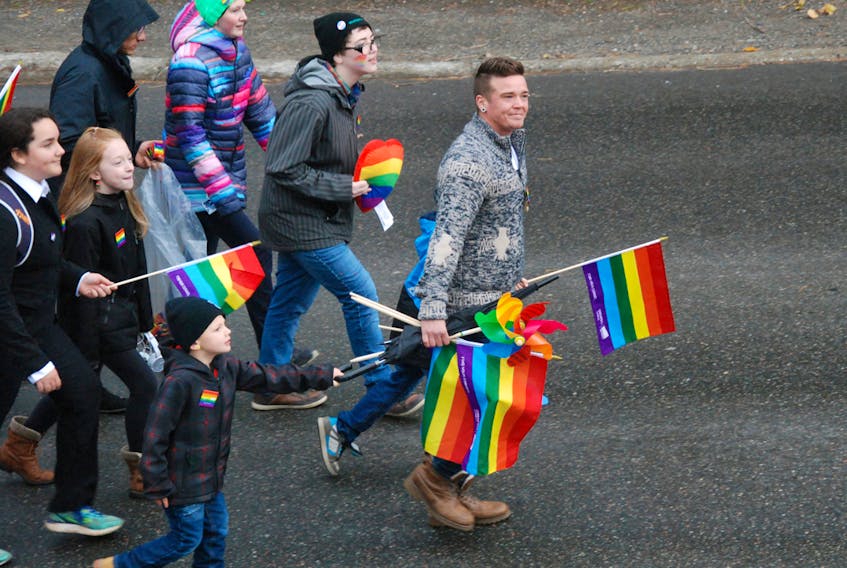 Krys Kavanagh had two of his three boys on his side as he made his way up Mount Bernard Avenue during the Corner Brook Pride Parade Saturday in Corner Brook.