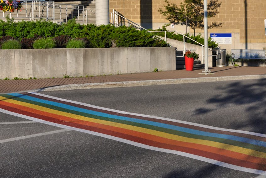 The rainbow pride crosswalk outside Corner Brook City Hall is seen on Tuesday evening.