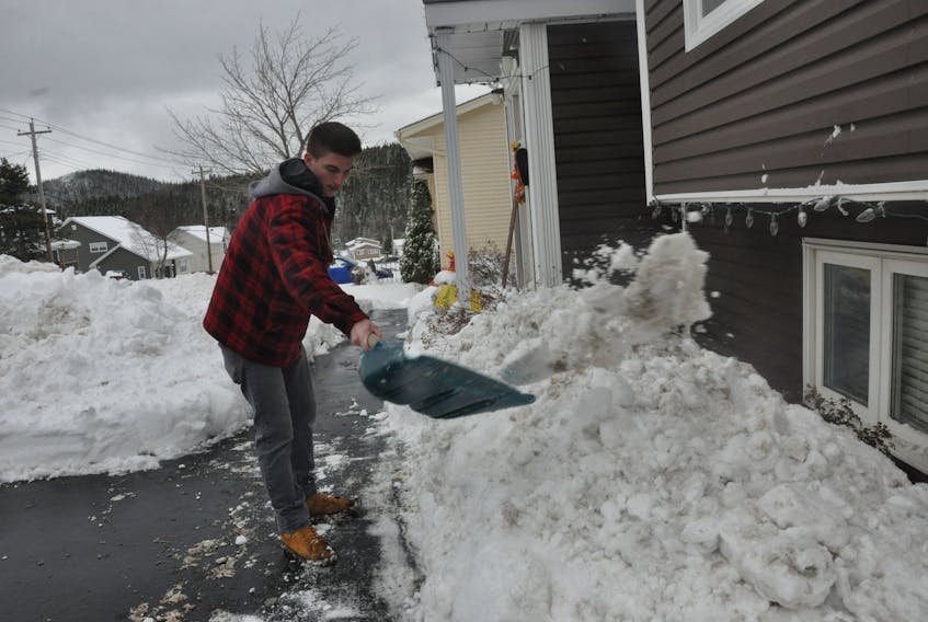 Doug King puts some finishing touches on his driveway on Carberry's Road in Corner Brook Saturday afternoon. High winds and a persistent snow overnight left residents in clean-up mode, but it looks like it's going to be a white week as snow is forecasted for the Corner Brook area for the next handful of days.