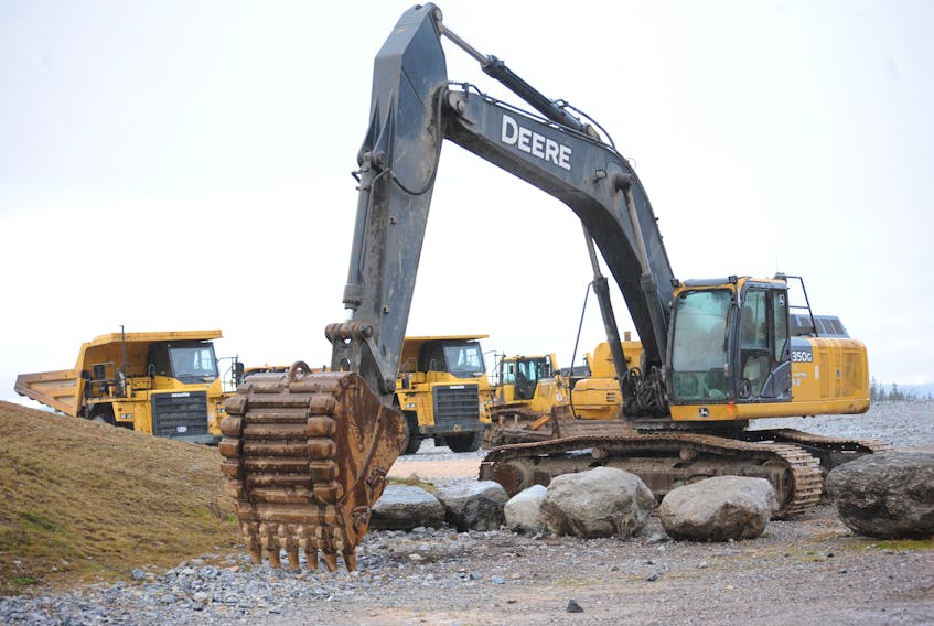 Heavy equipment — including two excavators, two dump trucks, a grader and a bulldozer — was staged at the site of the new Western Memorial Regional Hospital in Corner Brook Monday.