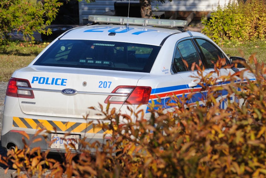 The Royal Newfoundland Constabulary maintained a presence throughout the day Wednesday at a property where a firearm was allegedly discharged on Clarence Street earlier in the morning. A woman and a man were each charged with offences as a result of the investigation.