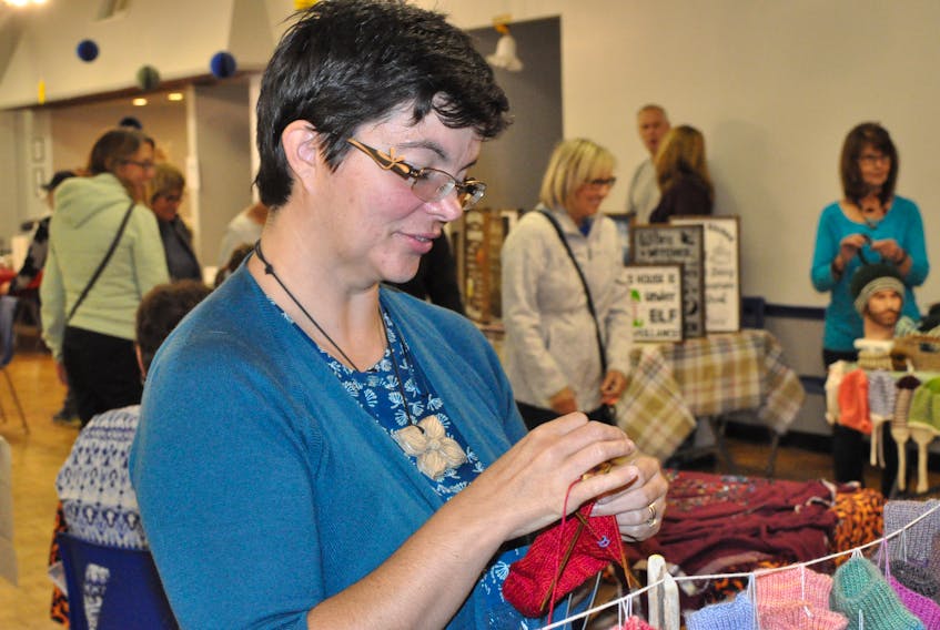 Veronica Bavis of Massey Drive, but soon to be based out of Cow Head, brought her Skivvers Hand Knits to the market. Bavis never missed a stitch as she knitted and chatted with people looking at her knitted goods.