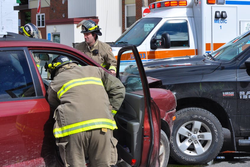 A Reidville woman was ticketed for failing to yield at an intersection after the truck she was driving collided with an SUV on Central Street in Corner Brook on Thursday.