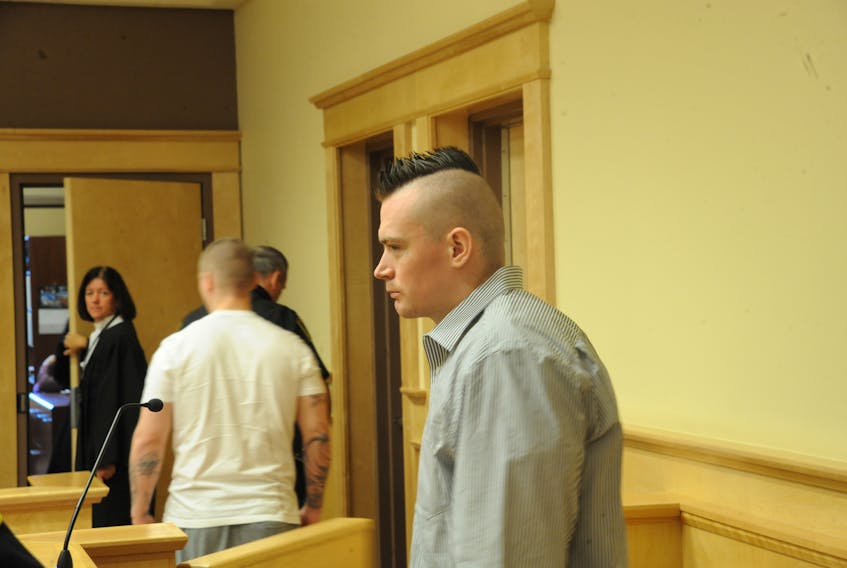 Paxton Sheahan (right) and Dillon Bourgeois in court in Corner Brook Wednesday. The pair are expected to be sentenced for aggravated assault today.