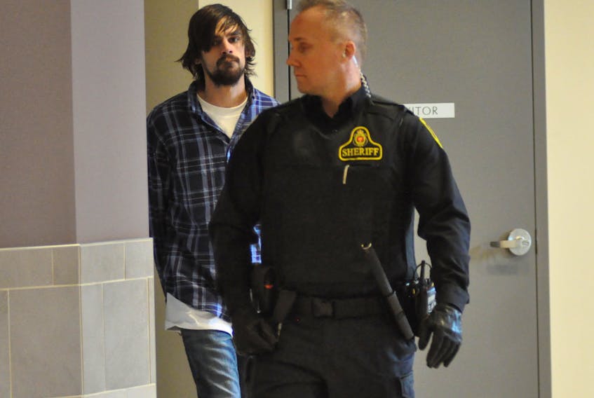 Four people have now been arrested in connection with a home invasion in Reidville last weekend. Tanner Thomas Healey, 23, seen here being led to a courtroom at the provincial court in Corner Brook on Thursday morning, and Ricky Leslie Halfyard, 29, both of Deer Lake, were arrested Monday as the result of an investigation into the incident alleged to have occurred on Sunday night.