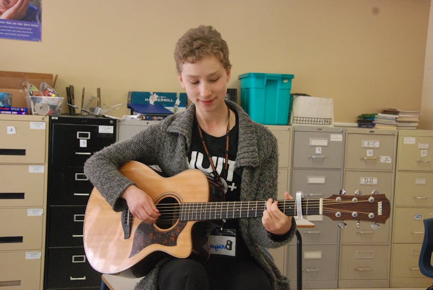 Corner Brook's Bridget Swift participates in a songwriting and performance workshop at Make Music Happen 5 - presented by Mr. H - at Corner Brook Regional High on Saturday afternoon.
