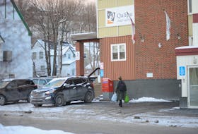 Staff leave work for the day at the Qalipu Mi’kmaq First Nation Band office in Corner Brook Thursday. Earlier this week, the band and the federal government began talks concerning how to reassess thousands of people denied band membership.