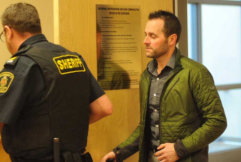 Kirby Hamlyn enters provincial court to listen to the judge’s decision in his assault causing bodily harm trial in Corner Brook Thursday.