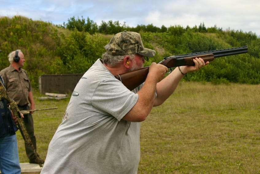 Alan Skinner, a member of the Stephenville Shooting Club, is seen doing some skeet shooting at the existing range while Eric Collins, another member, is seen in the background.