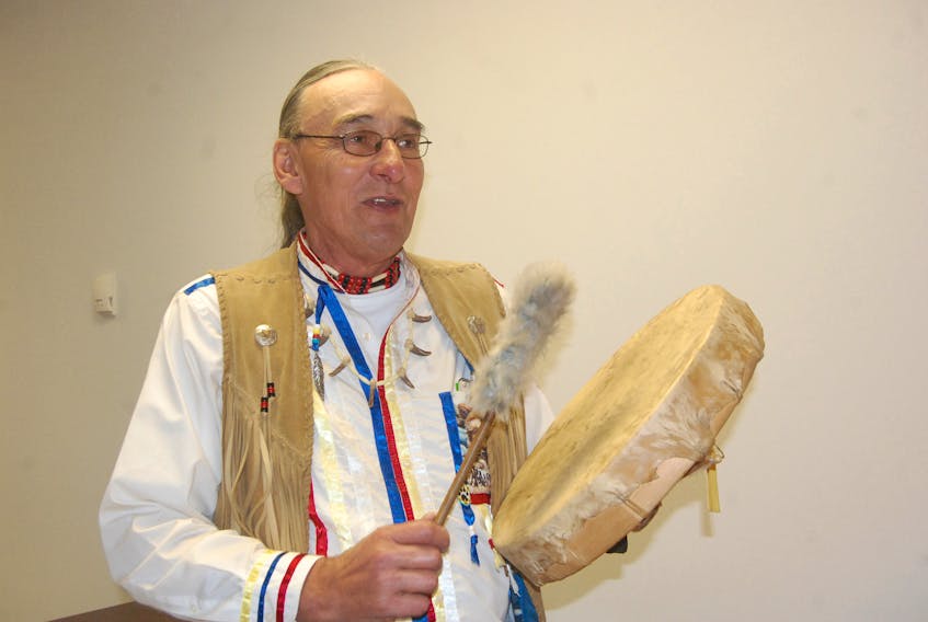 Victor Muise plays his drum in this file photo.