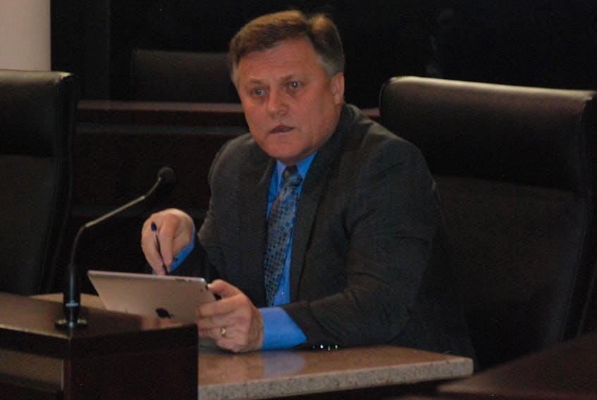 Coun. Josh Carey speaks during the city council meeting on Monday night at city hall.