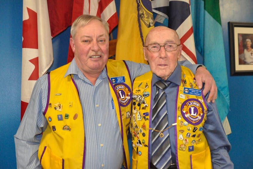 Lion Chris Tiller, left and his father-in-law Lion Eric Lomond pose for a photo prior to the annual Stephenville Lions and Lioness Club Charter Night event on Tuesday. Lomond is a charter member of the St. George’s Lions Club.