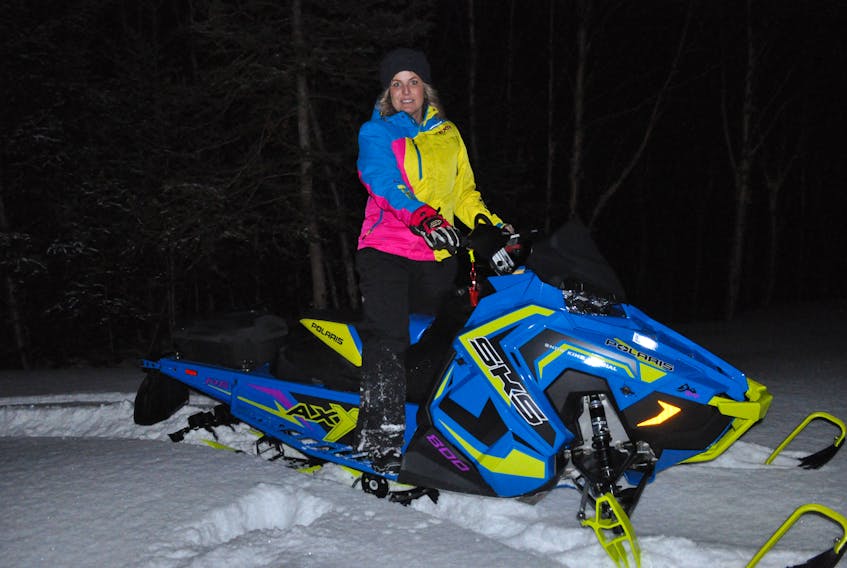 Sherri Alexander will be taking her snowmobile to Cormack on Saturday in order to get a better understanding of it during Sledcore's all-female riding clinic.