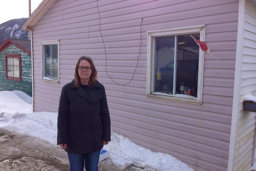 Kimberly Herritt's municipal tax bill has doubled now that the Town of Lark Harbour has stopped pooling property assessments.