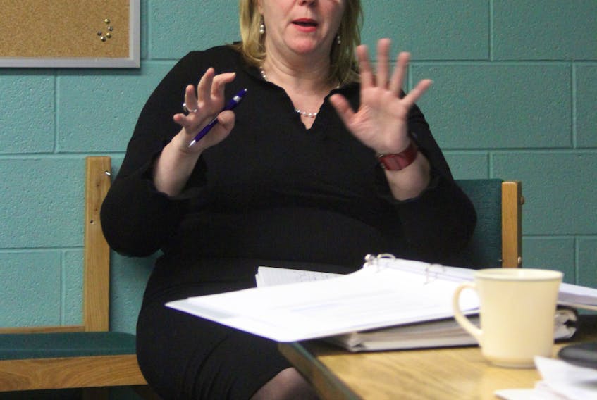 Patricia Williams of the Department of Fisheries and Oceans responds to a question Thursday night at Grenfell Campus.