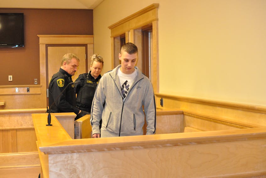 Dillon Joseph Bourgeois, 25, is seen in the Supreme Court of Newfoundland and Labrador in Corner Brook on Thursday morning just prior to the start of his trial on an armed robbery charged.