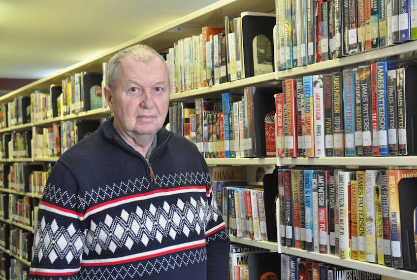 Larry Gee is the author of "Kate & I - The Beginning," his first full-length novel. He poses in Kindale Public Library in Stephenville.